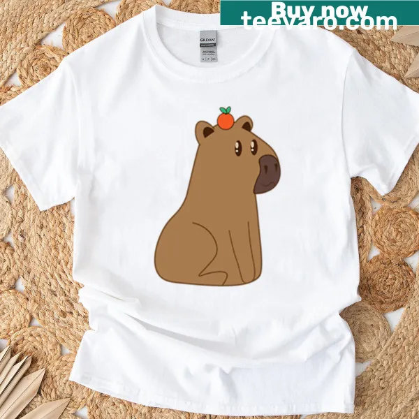Cute capybara with orange on head t-shirt design