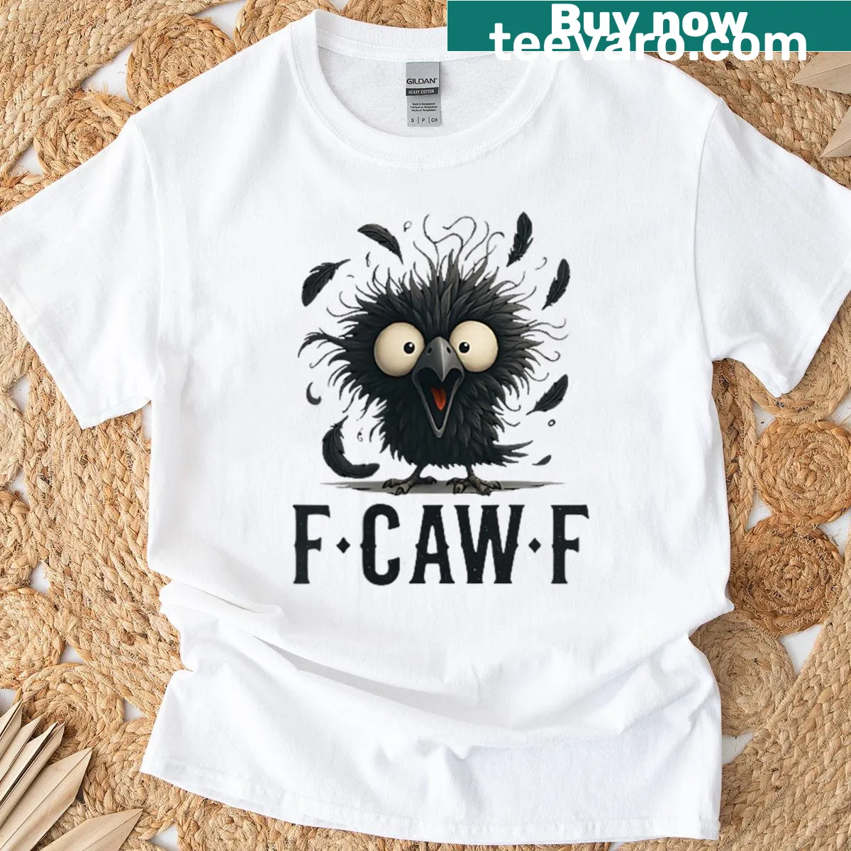 Gothic t-shirt featuring a black crow and the phrase F-caw-f. — on a men's t-shirt