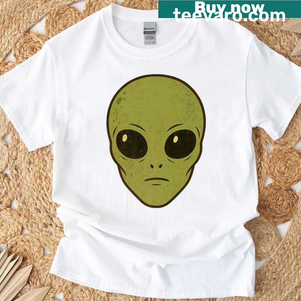 Cartoon green alien head t-shirt for Halloween — on a men's t-shirt