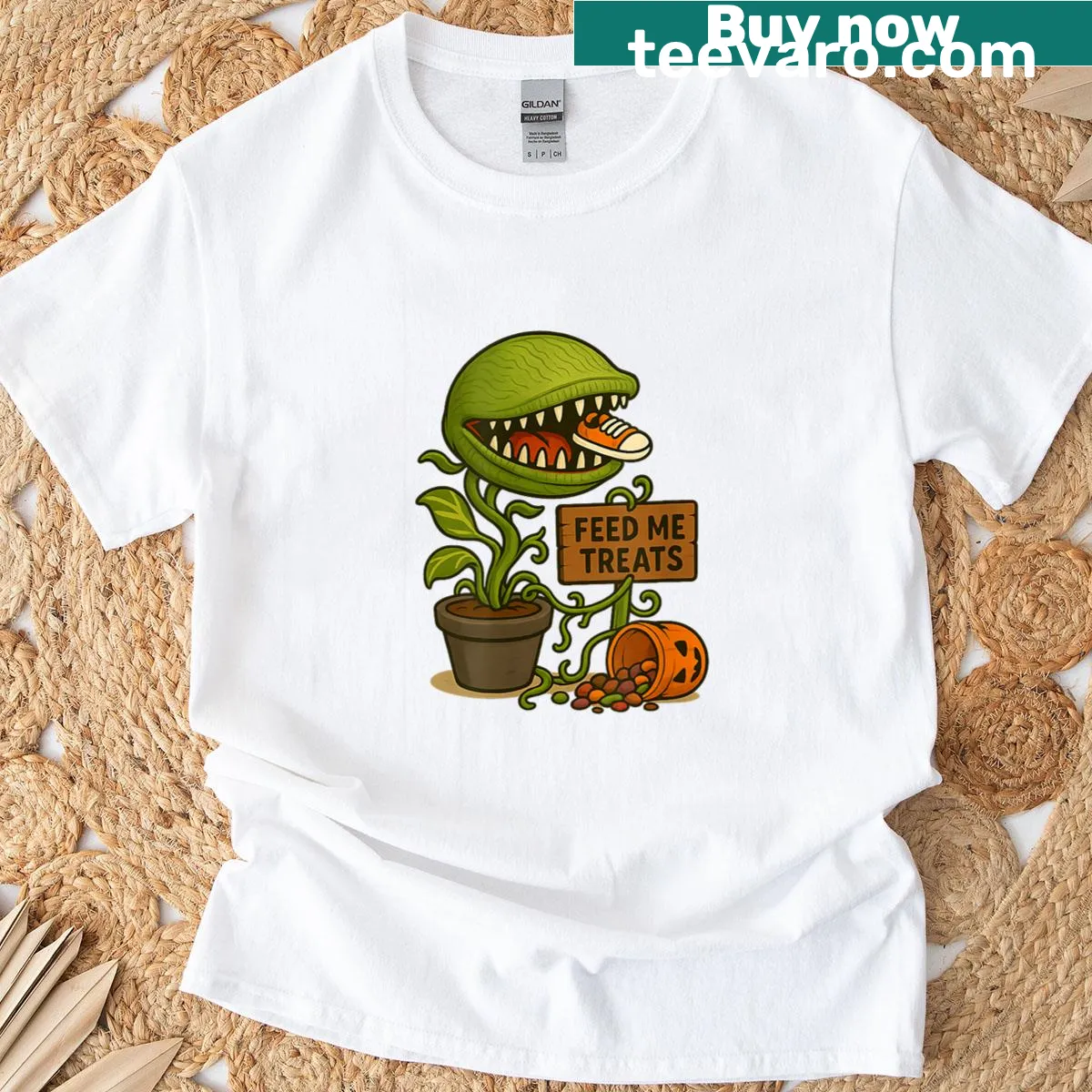 Halloween t-shirt with 'Feed Me Treats' graphic — on a men's t-shirt