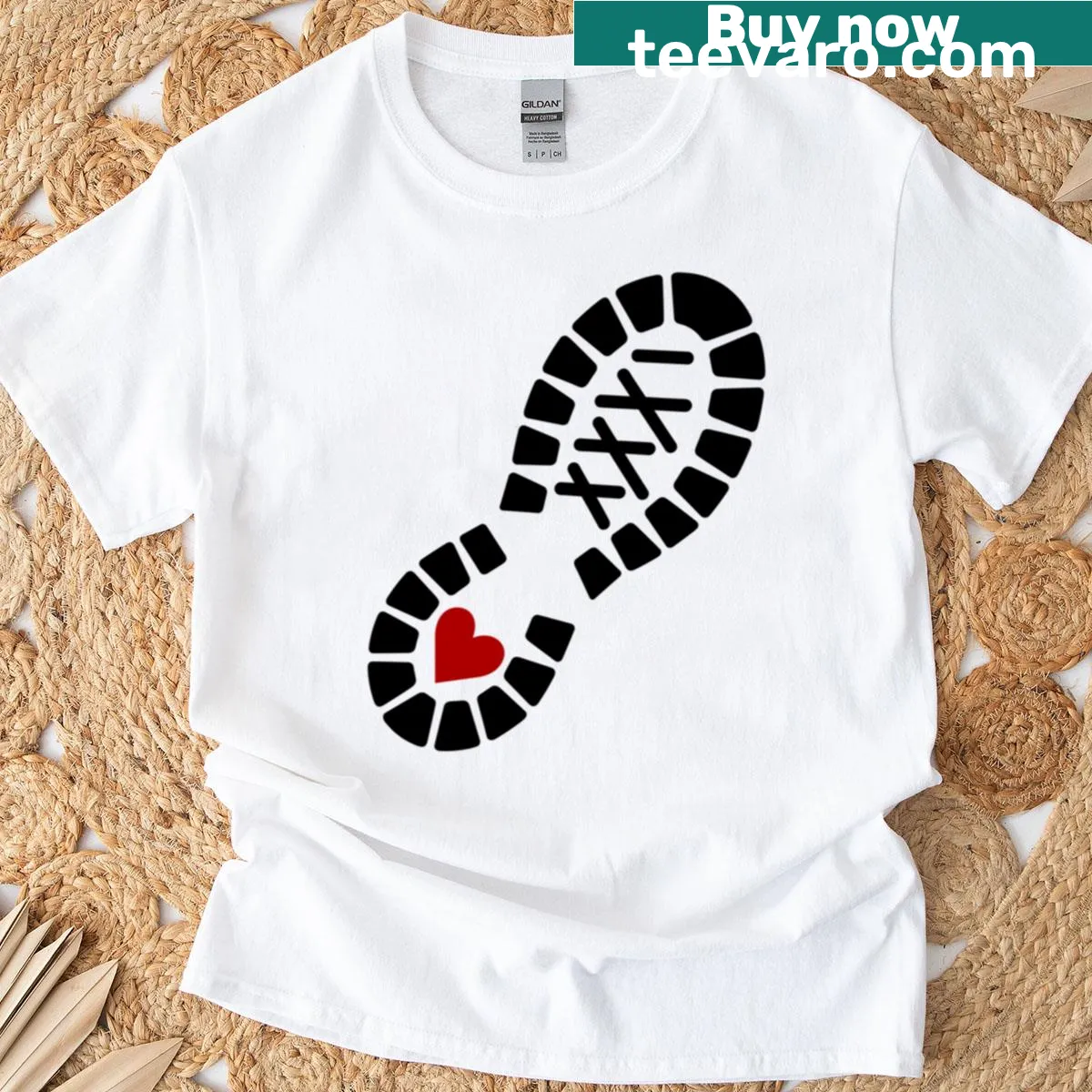 Heart and footprint graphic T-shirt symbolizing love — on a men's t-shirt