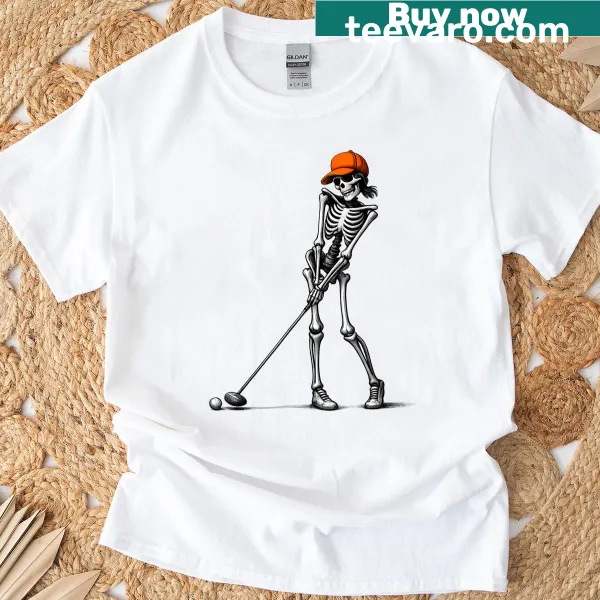 Illustrated female skeleton golfer in a Halloween-themed T-shirt.