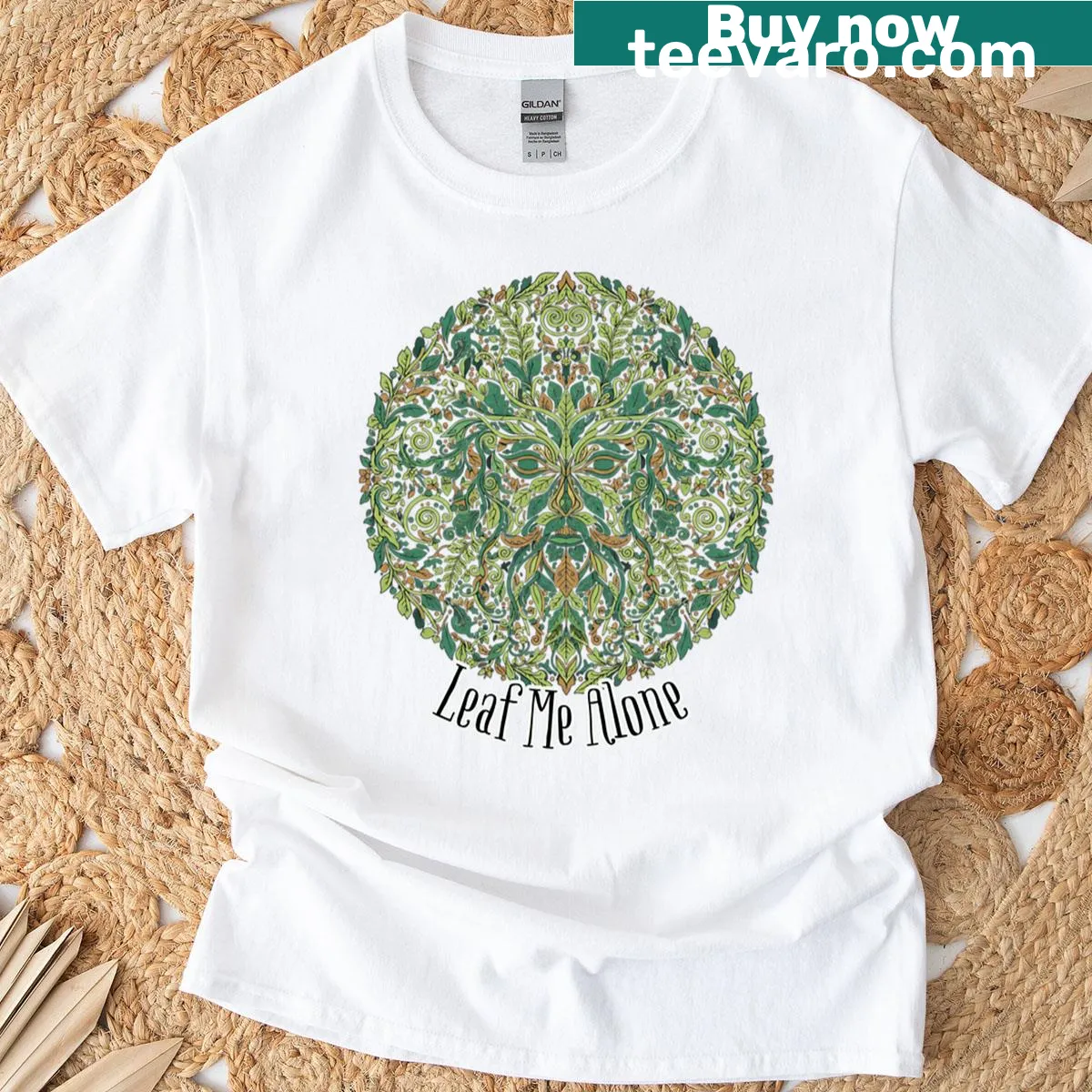 Celtic Green Man illustration with the text 'Leaf Me Alone' on a T-shirt — on a men's t-shirt