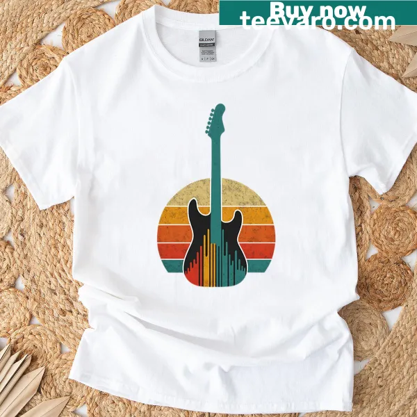 Artistic guitar silhouette against a sunset illustration