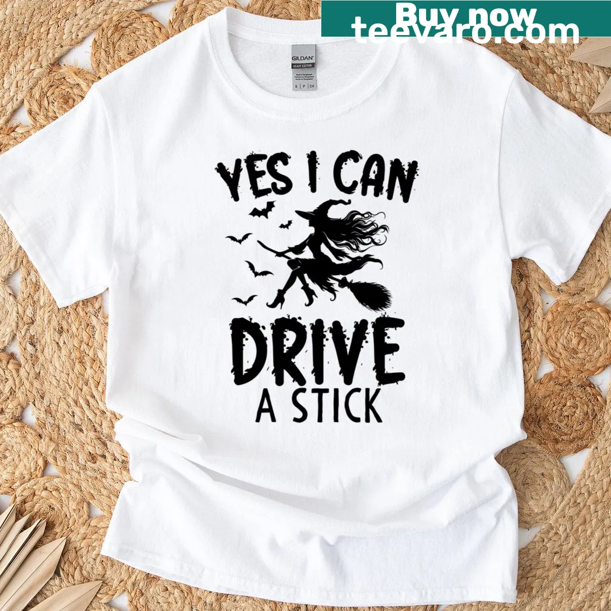 Funny witch design with text 'Yes I Can Drive A Stick' on T-shirt — on a men's t-shirt