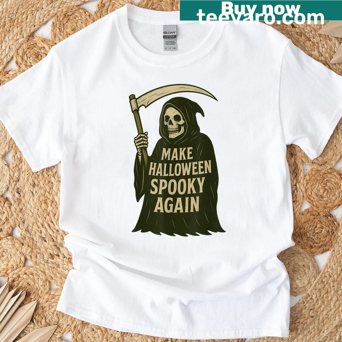 Halloween t-shirt featuring a whimsical reaper illustration. — on a men's t-shirt