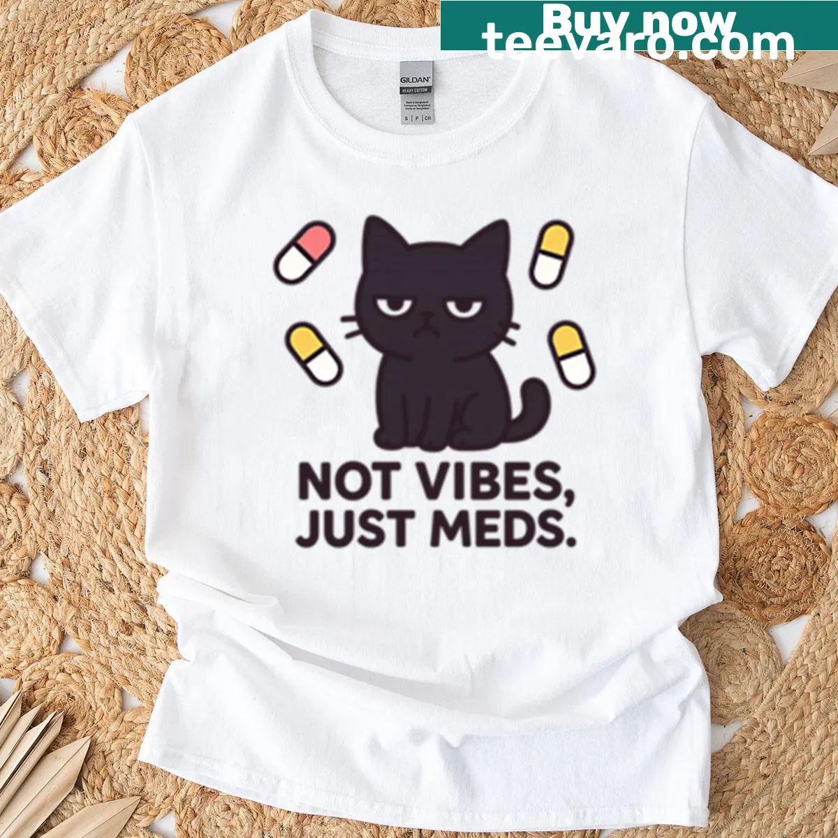 T-shirt with black cat illustration and humorous text about medications — on a men's t-shirt