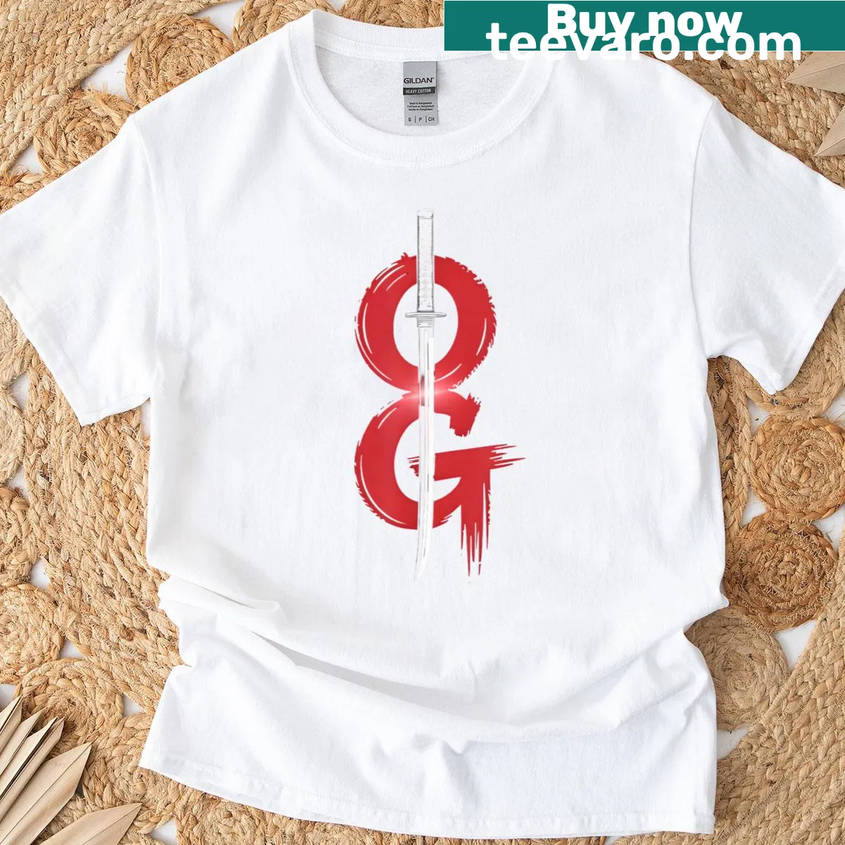 Bold sword graphic T-shirt in red brush style design — on a men's t-shirt