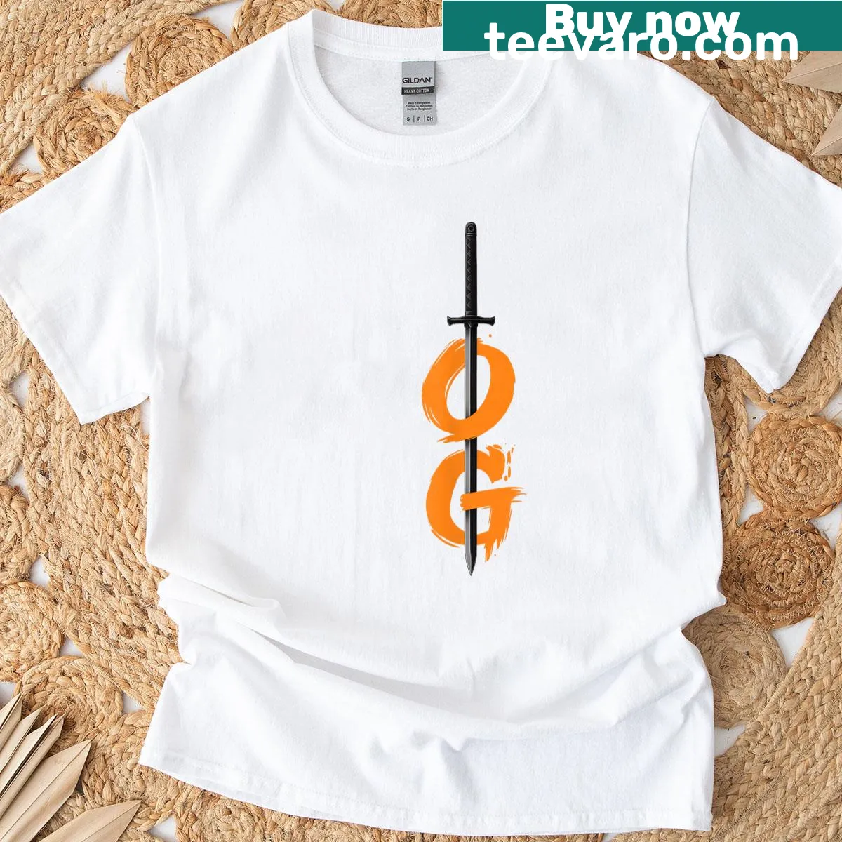 Graphic tee with a bold sword illustration in brush art style. — on a men's t-shirt