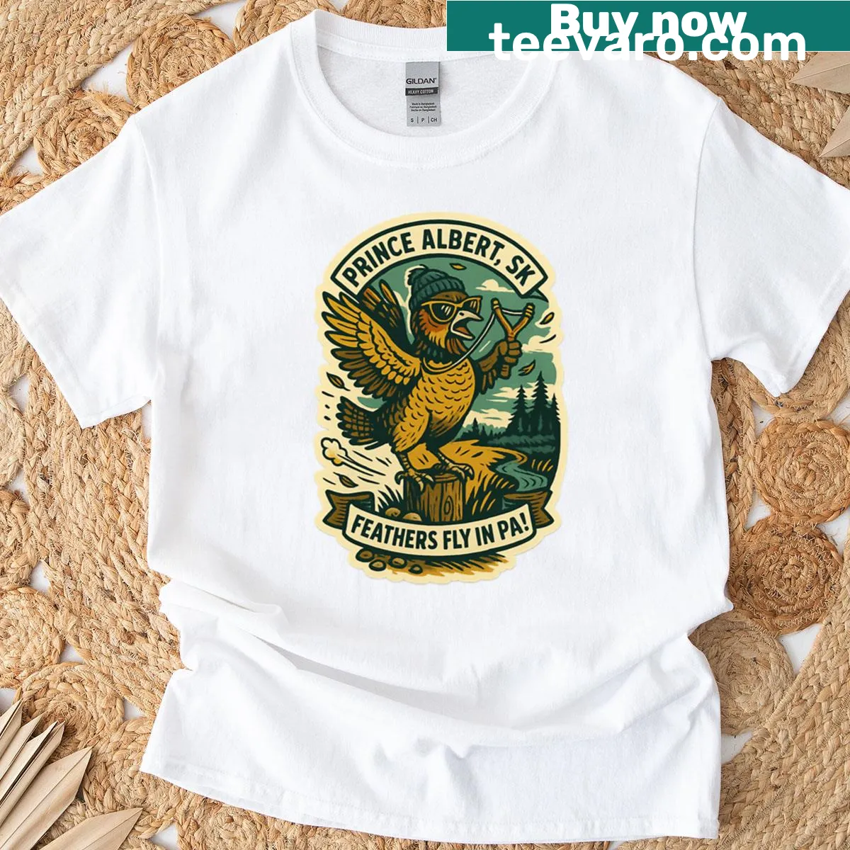 Cartoon prairie chicken flying with slingshots on T-shirt — on a men's t-shirt