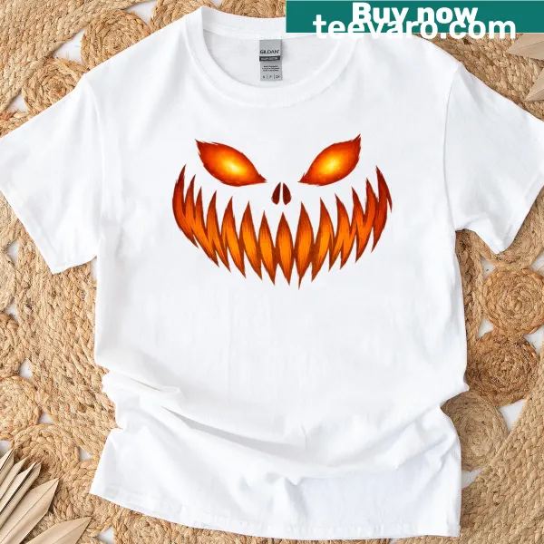 Graphic of a scary carved pumpkin face on a T-shirt