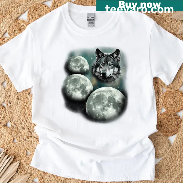 Fantasy T-shirt featuring a wolf howling at three moons