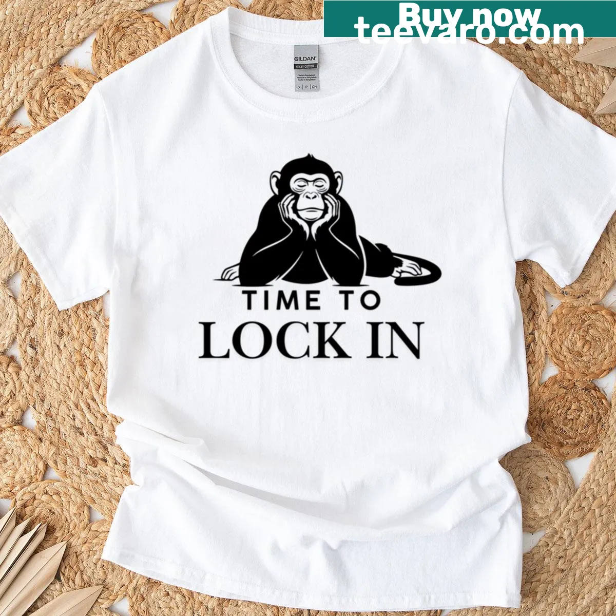 Bold oversized T-shirt with motivational message to lock in focus. — on a men's t-shirt