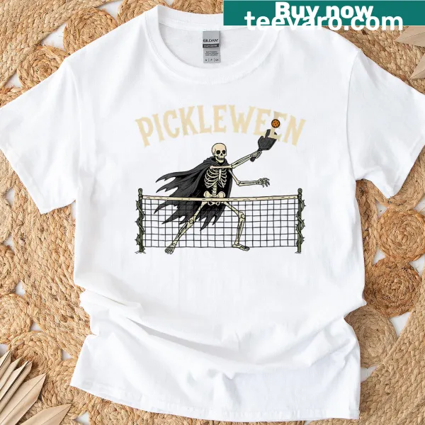 Funny skeleton playing pickleball illustration on Halloween T-shirt.