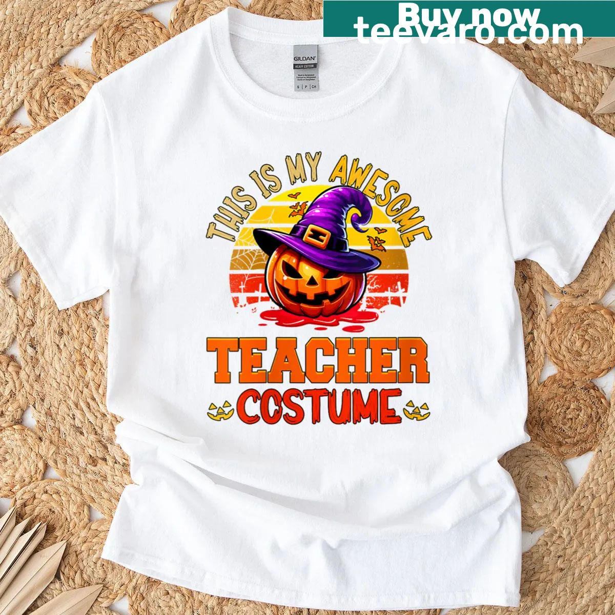 Vintage teacher t-shirt featuring a carved pumpkin and witch hat design — on a men's t-shirt