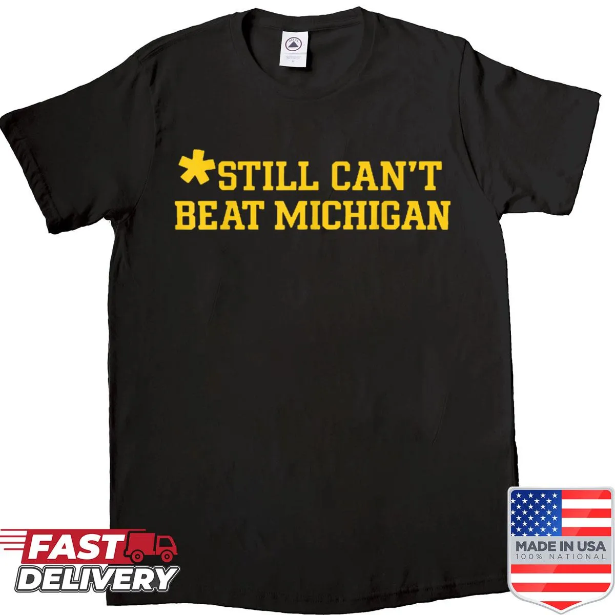 Repeated text 'Still Cant Beat Michigan' on a casual shirt