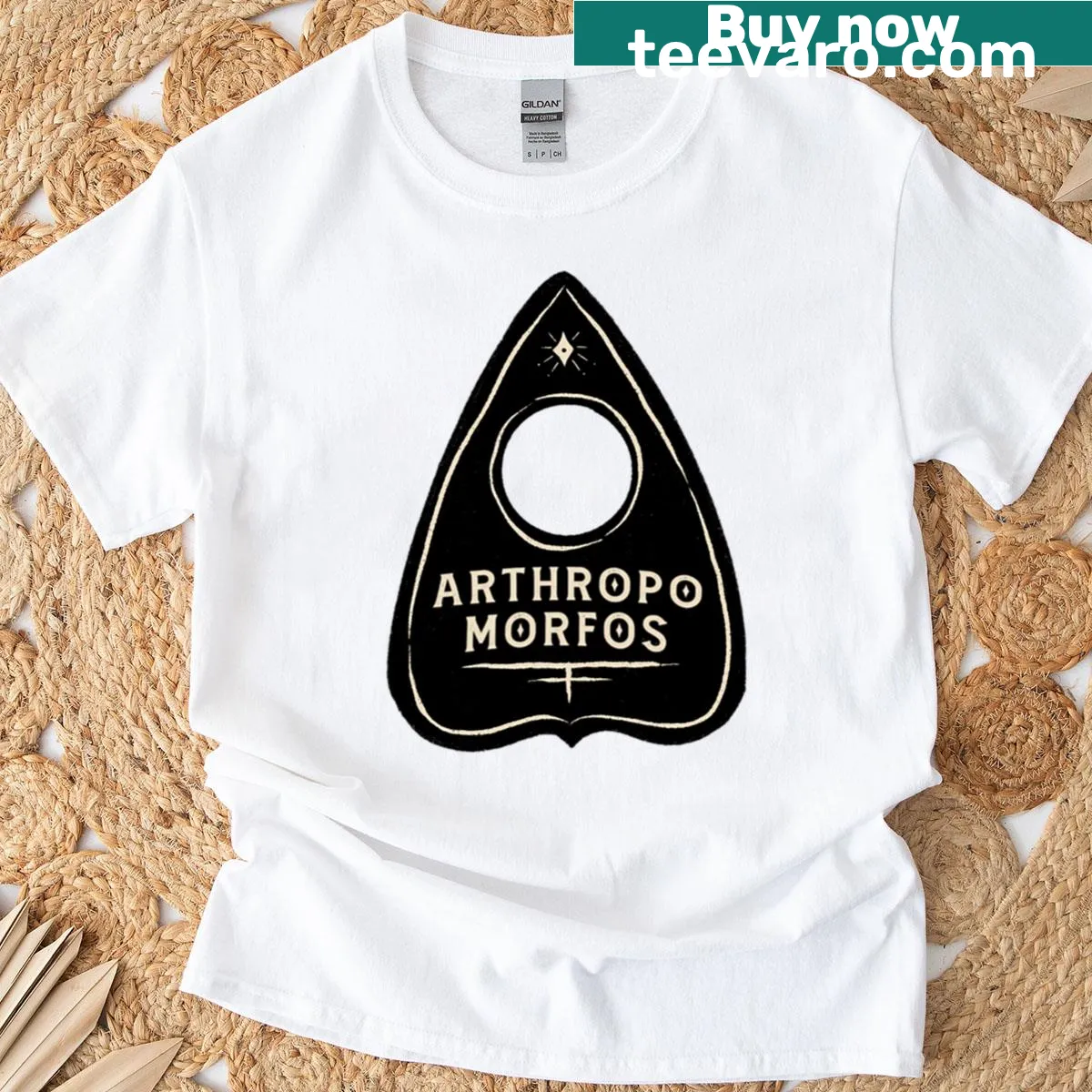 Black t-shirt featuring a minimalist Arthropo Morfos logo — on a men's t-shirt