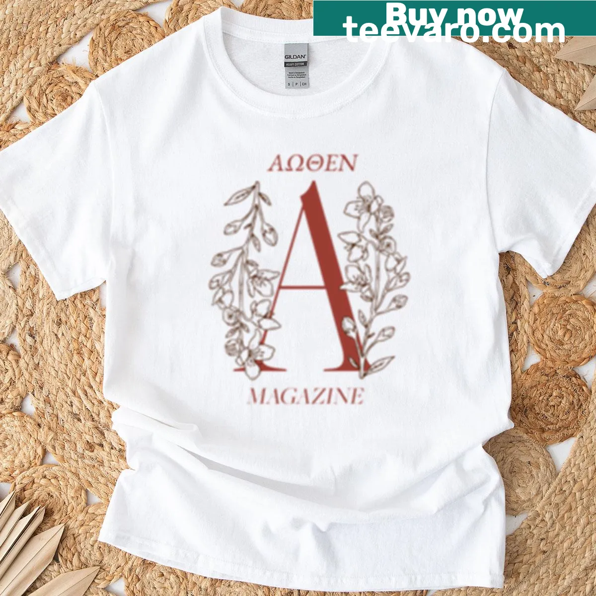 Minimalist Athen Magazine logo on a clean T-shirt — on a men's t-shirt