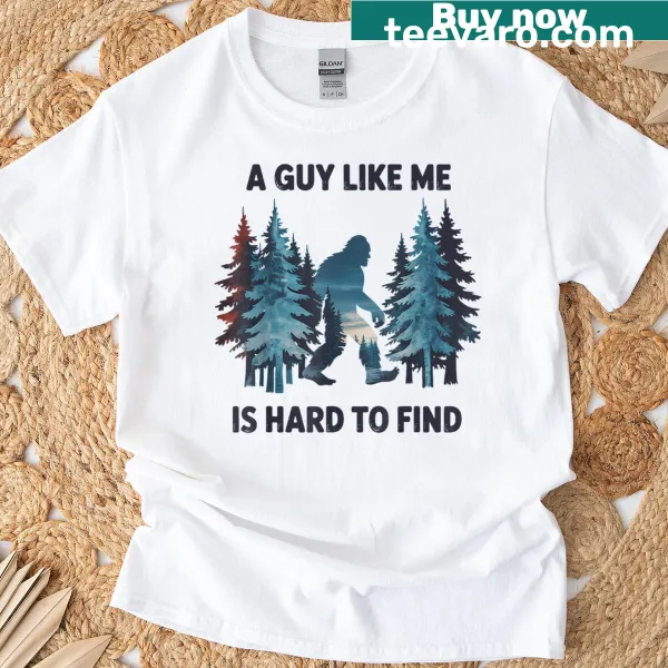 Cartoon T-shirt featuring Bigfoot and playful text about forest finding.