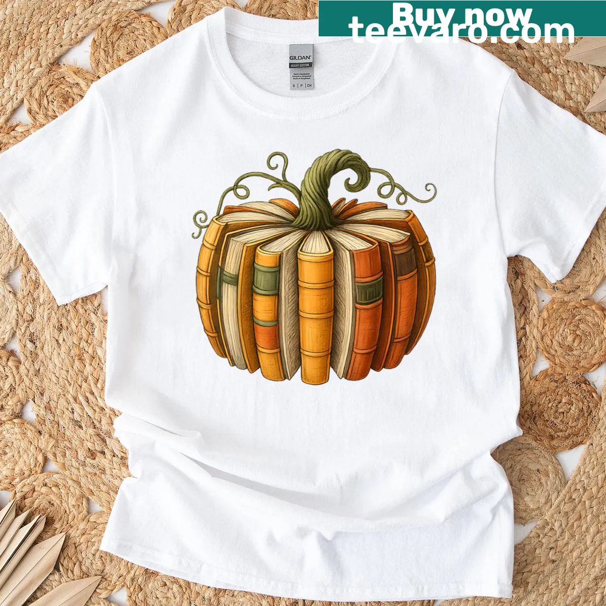 Cute pumpkin and book graphic for Halloween-themed teacher T-shirt — on a men's t-shirt