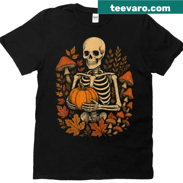 Vintage-style T-shirt with floral, mushroom, skeleton, and pumpkin designs.
