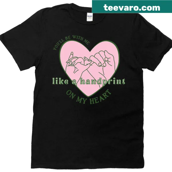 T-shirt with text 'Wicked Like A Handprint On My Heart' in playful typography