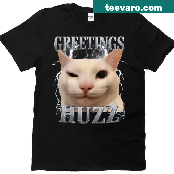 Graphic tee with the phrase 'Greetings Huzz' and playful cat illustration