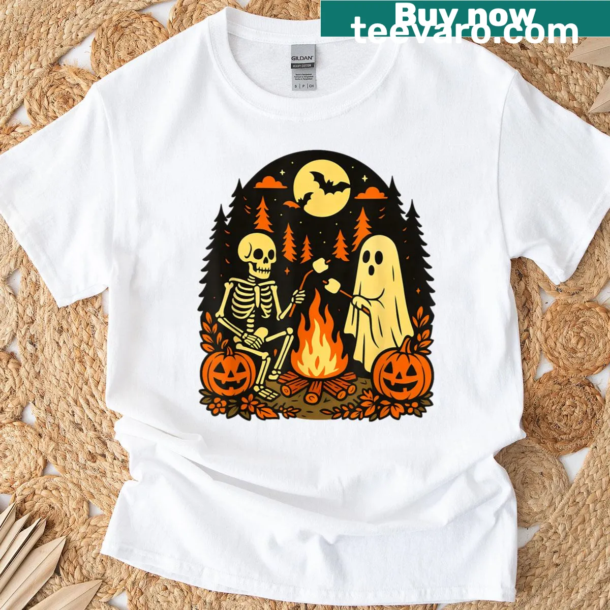Vintage Halloween t-shirt with a skeleton and ghost by a campfire — on a men's t-shirt