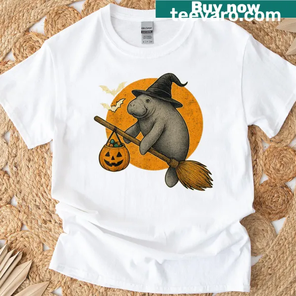 Cartoon manatee in a witch hat next to a pumpkin on a Halloween t-shirt