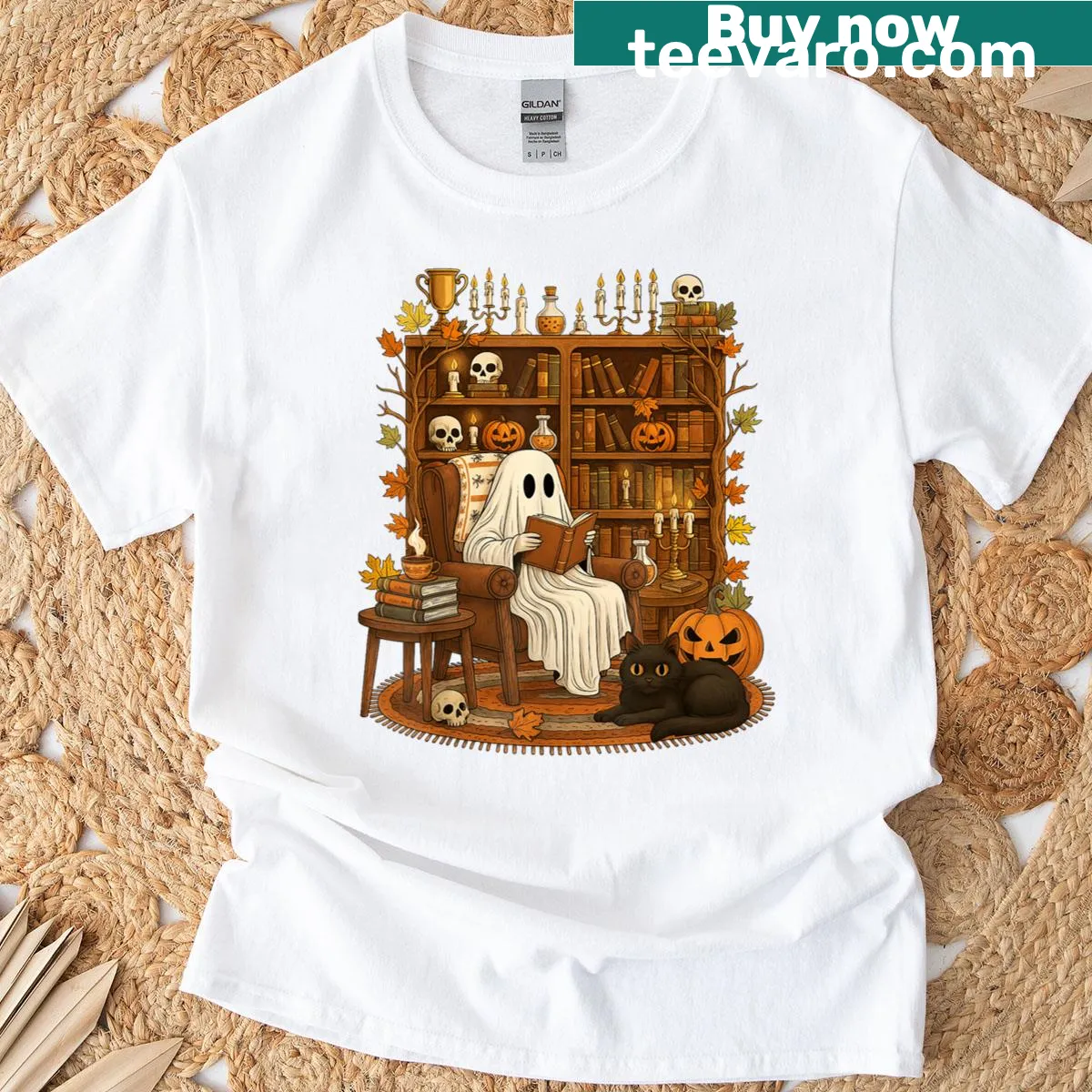 Halloween T-shirt featuring a ghost reading and a black cat — on a men's t-shirt