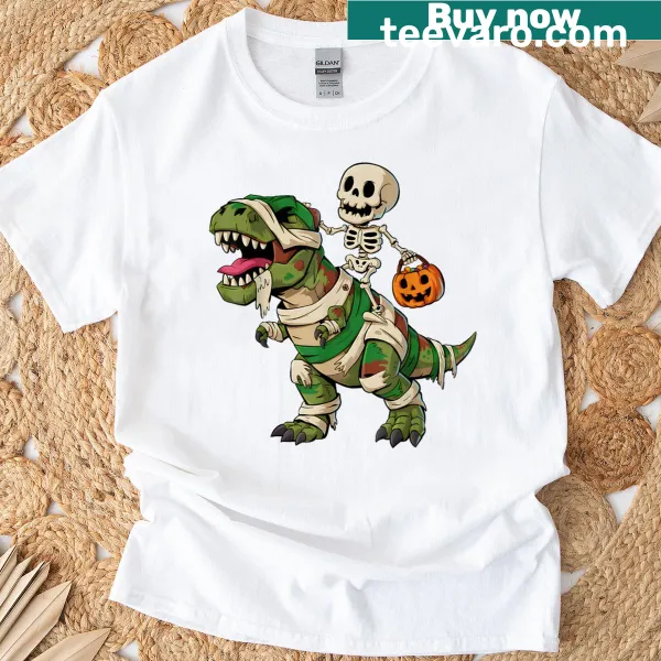 Kids T-shirt with a funny skeleton dinosaur and pumpkin design