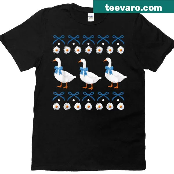 Cartoon T-shirt featuring a vintage blue bow and country goose design, perfect for retro lovers.