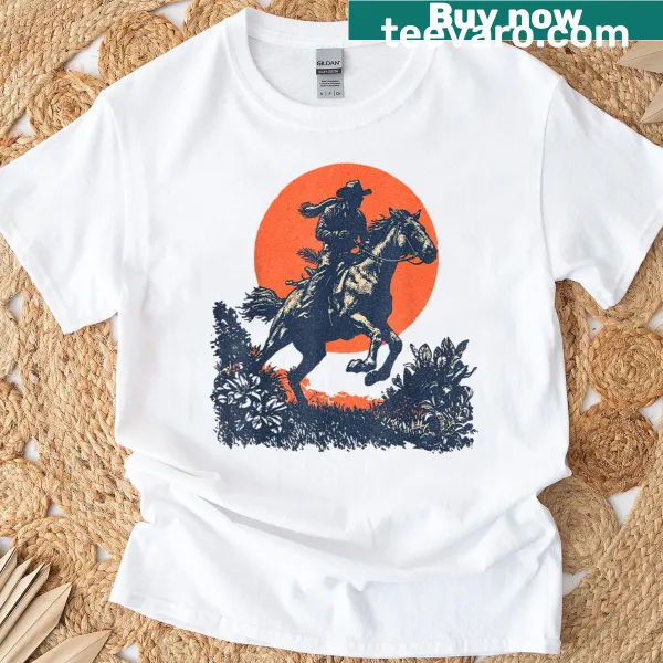 Retro Western graphic tee featuring a cowboy riding into the sunset