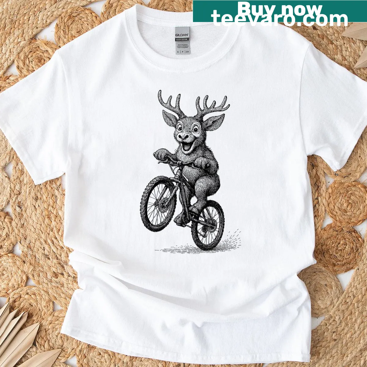 Kawaii reindeer riding a bicycle graphic t-shirt — on a men's t-shirt