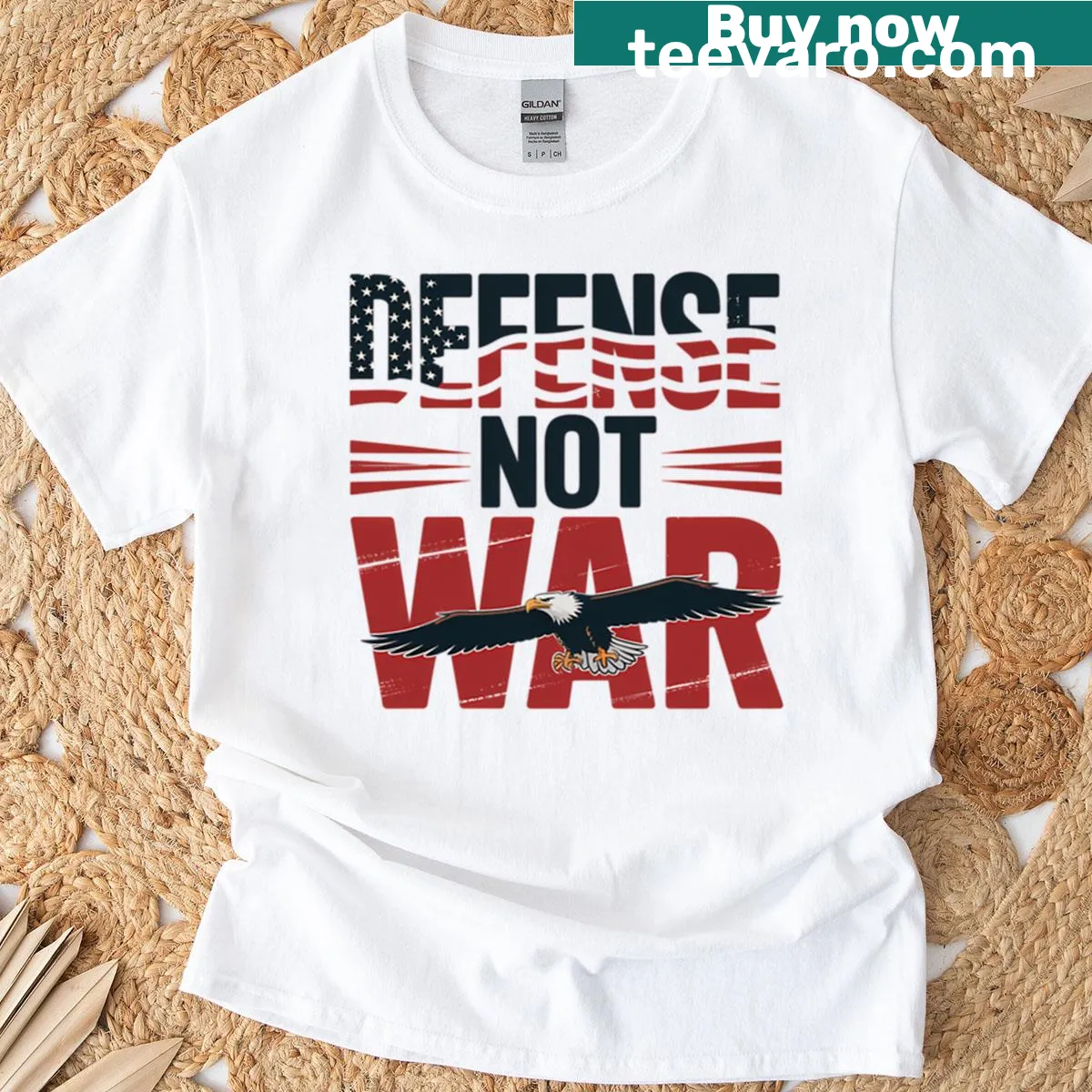 Vintage-style protest T-shirt with 'Defense Not War' message — on a men's t-shirt
