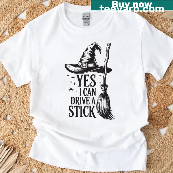 Funny Halloween T-shirt with a spooky witch graphic and text about driving a stick.