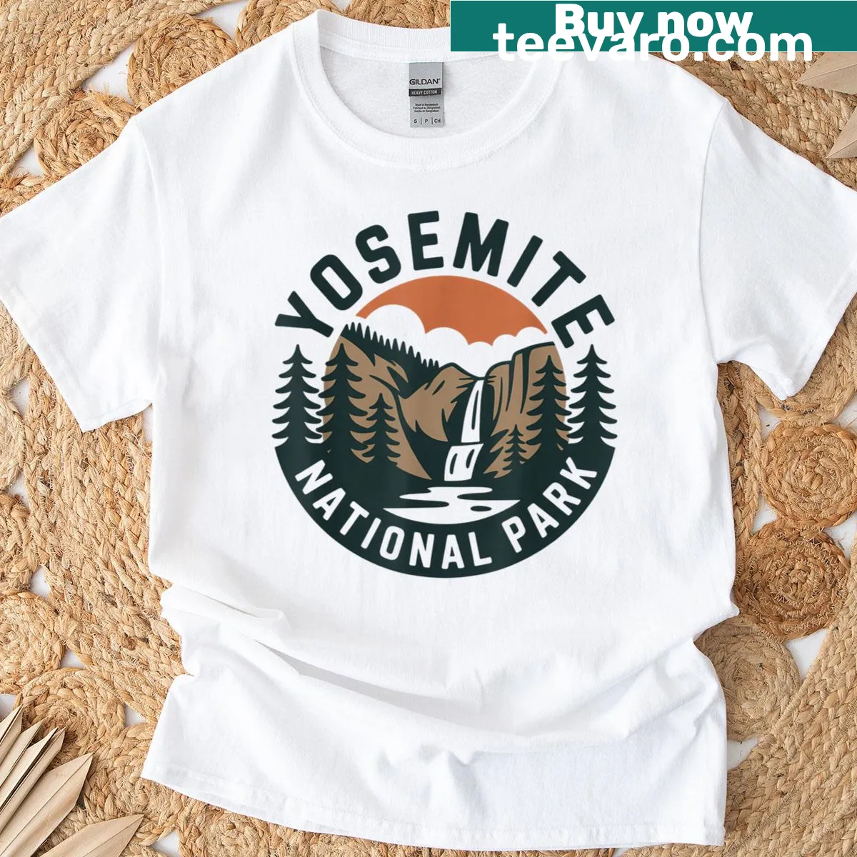 Vintage landscape T-shirt with a Yosemite waterfall and forest illustration. — on a men's t-shirt