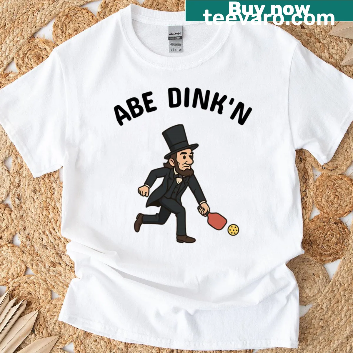 Playful Abraham Lincoln pickleball t-shirt — on a men's t-shirt