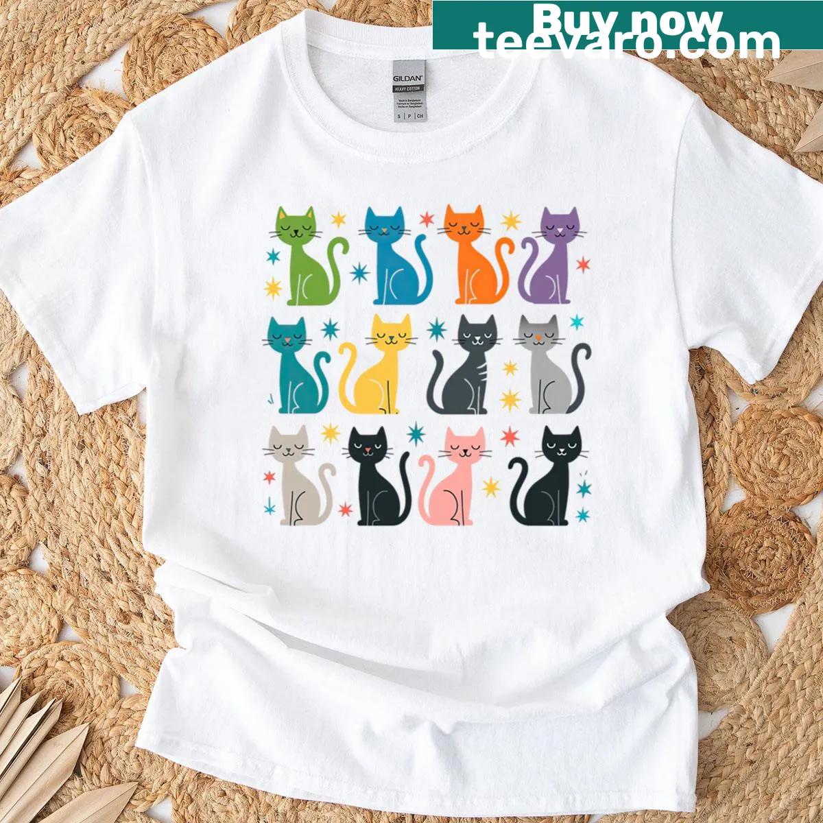 Playful cartoon cats with stars pattern on a t-shirt — on a men's t-shirt