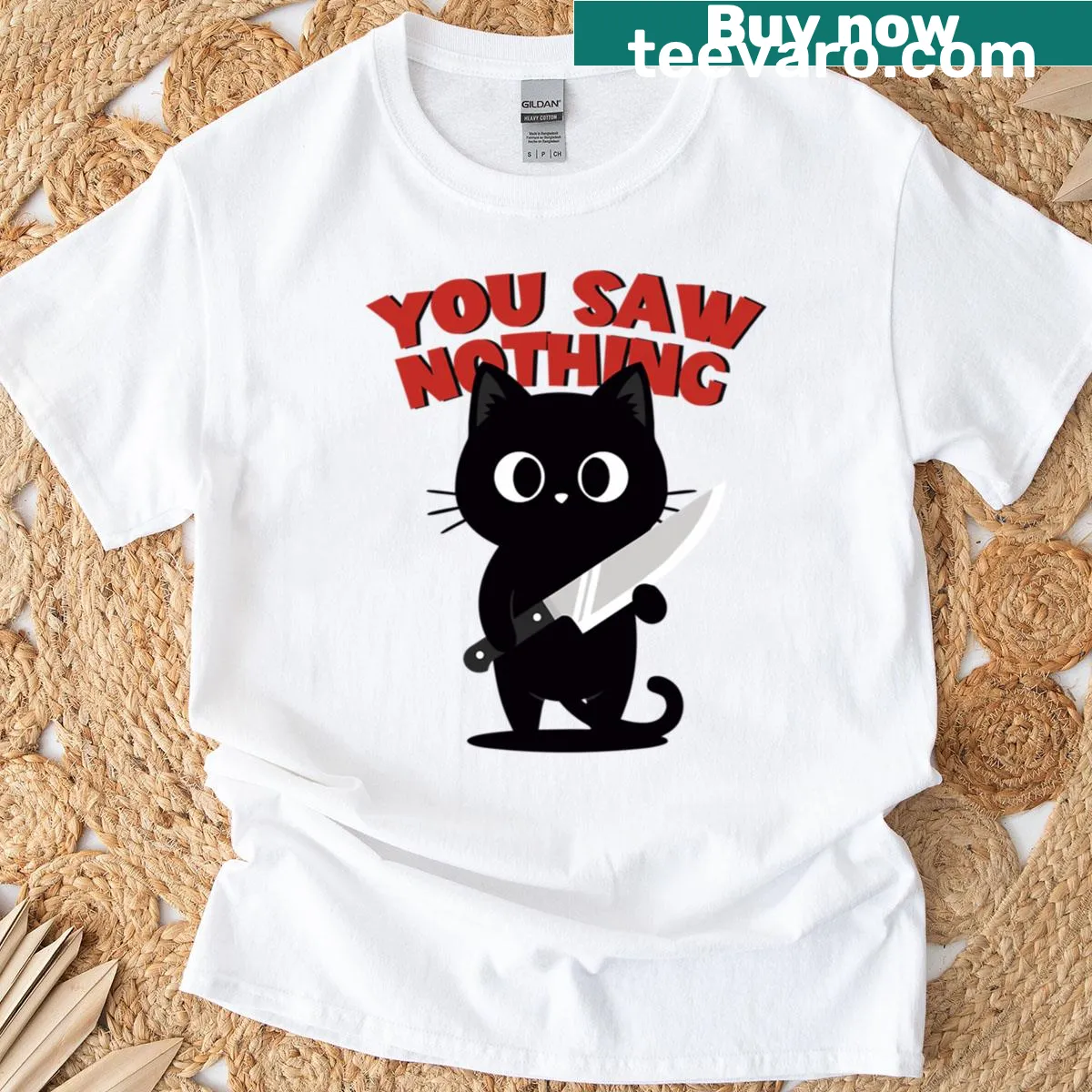 Funny black cat T-shirt with knife and humorous text — on a men's t-shirt