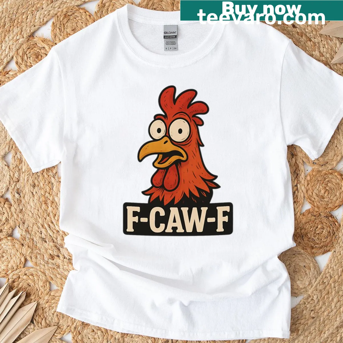Oversized T-shirt with a rooster logo design, embodying farm spirit — on a men's t-shirt