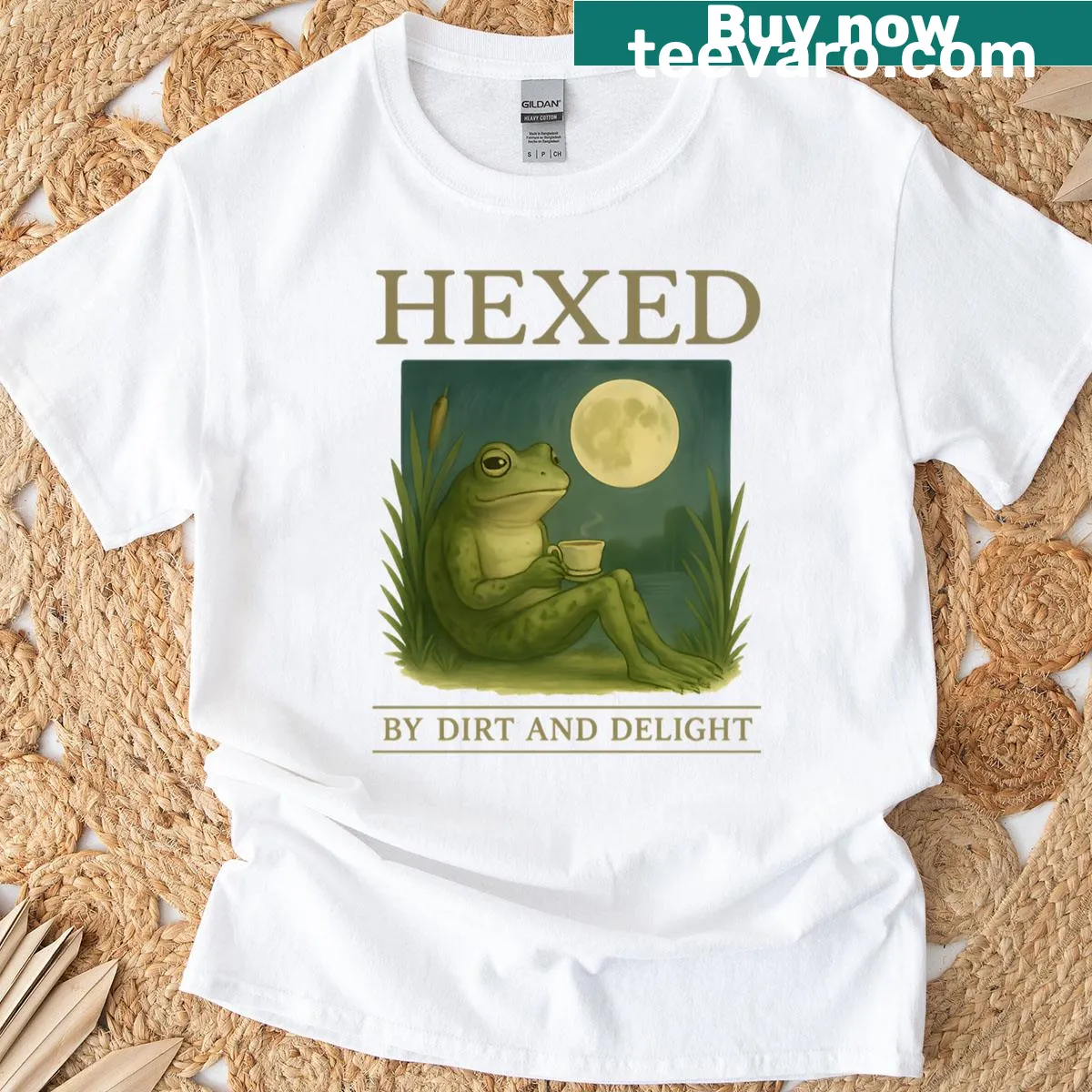 Illustrated frog drinking tea under the moon in a whimsical style — on a men's t-shirt