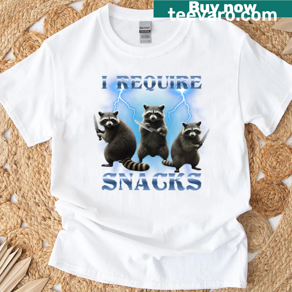 Chaotic raccoon demanding snacks in a playful bootleg art style — on a men's t-shirt