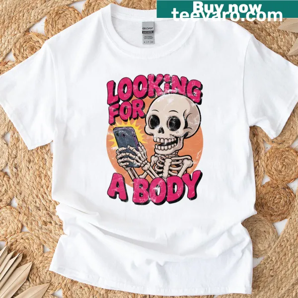 Funny skeleton design with 'Looking For A Body' text on an oversized t-shirt