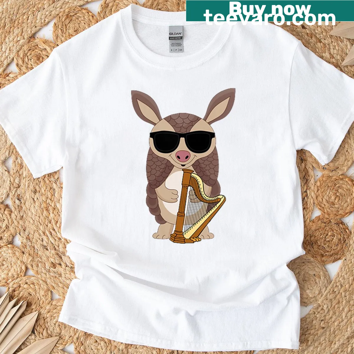 Funny cartoon armadillo playing harp graphic T-shirt for women — on a men's t-shirt