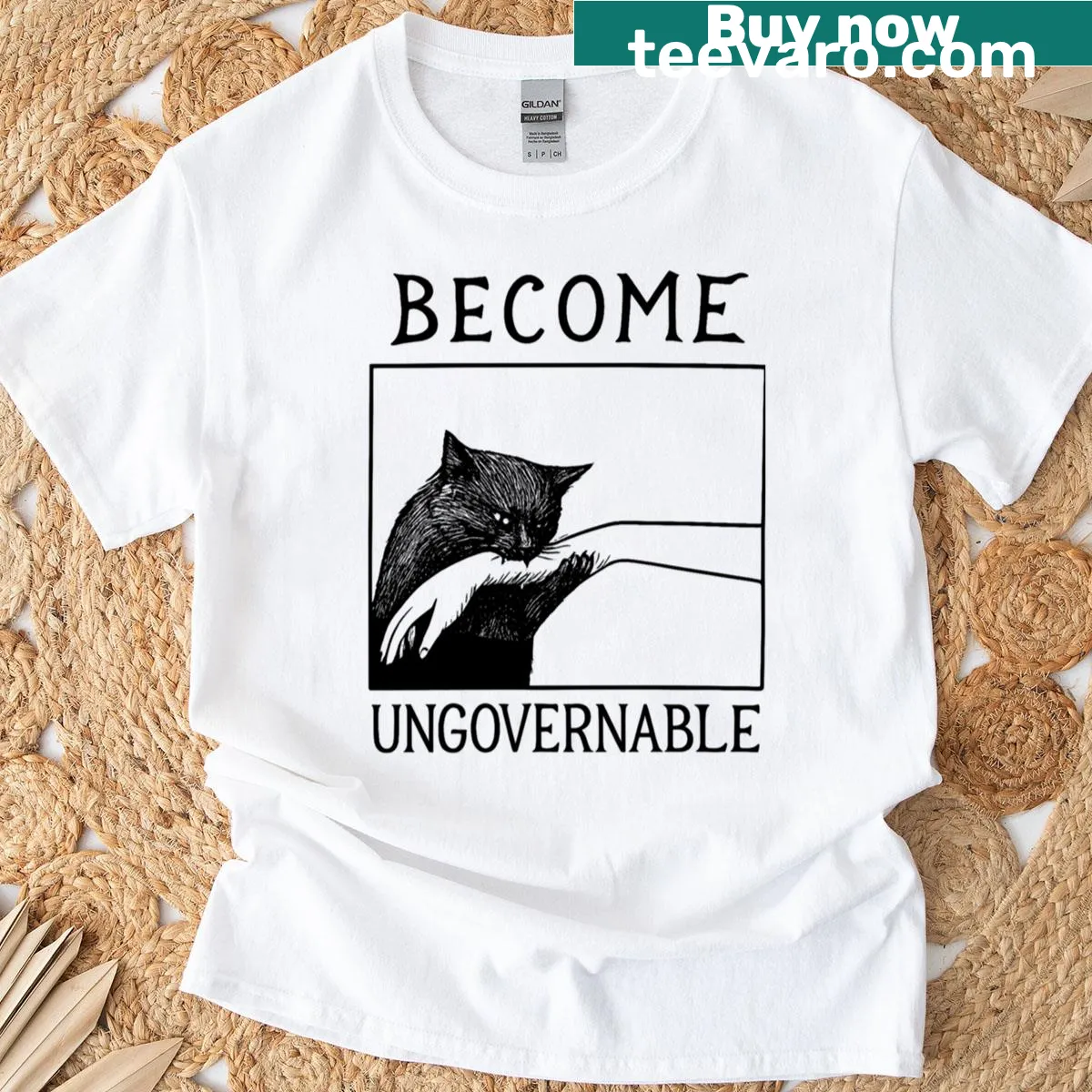Oversized T-shirt featuring a black cat biting a hand design — on a men's t-shirt