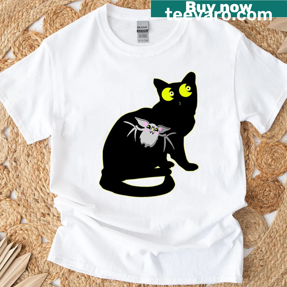 Cartoon black cat with bat graphic on T-shirt — on a men's t-shirt