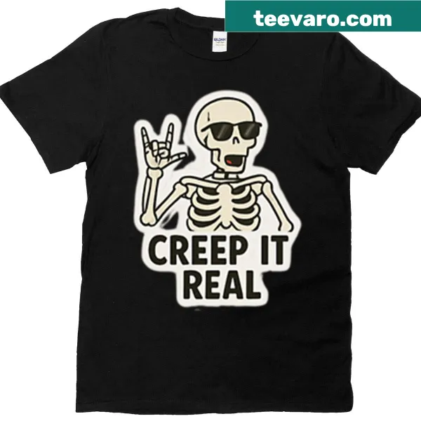 Oversized t-shirt with a ghost graphic and 'Creep It Real' text for Halloween
