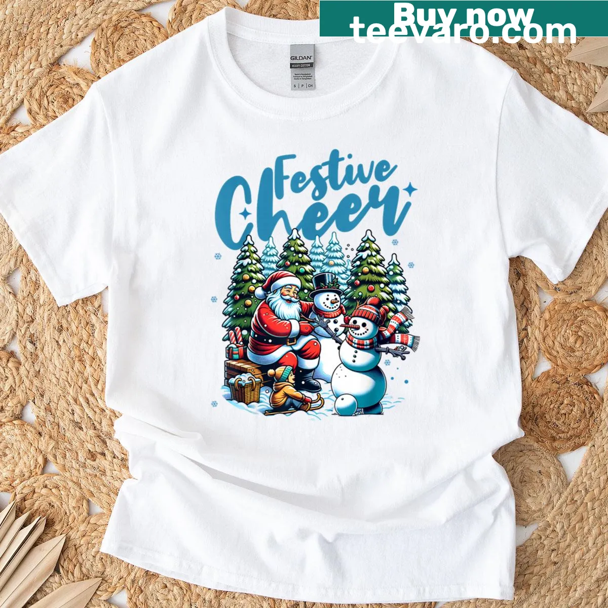 Christmas-themed T-shirt with Santa and snowman illustrations — on a men's t-shirt