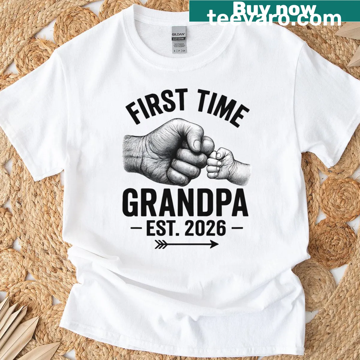 T-shirt celebrating first-time grandpas with fist bump graphic — on a men's t-shirt